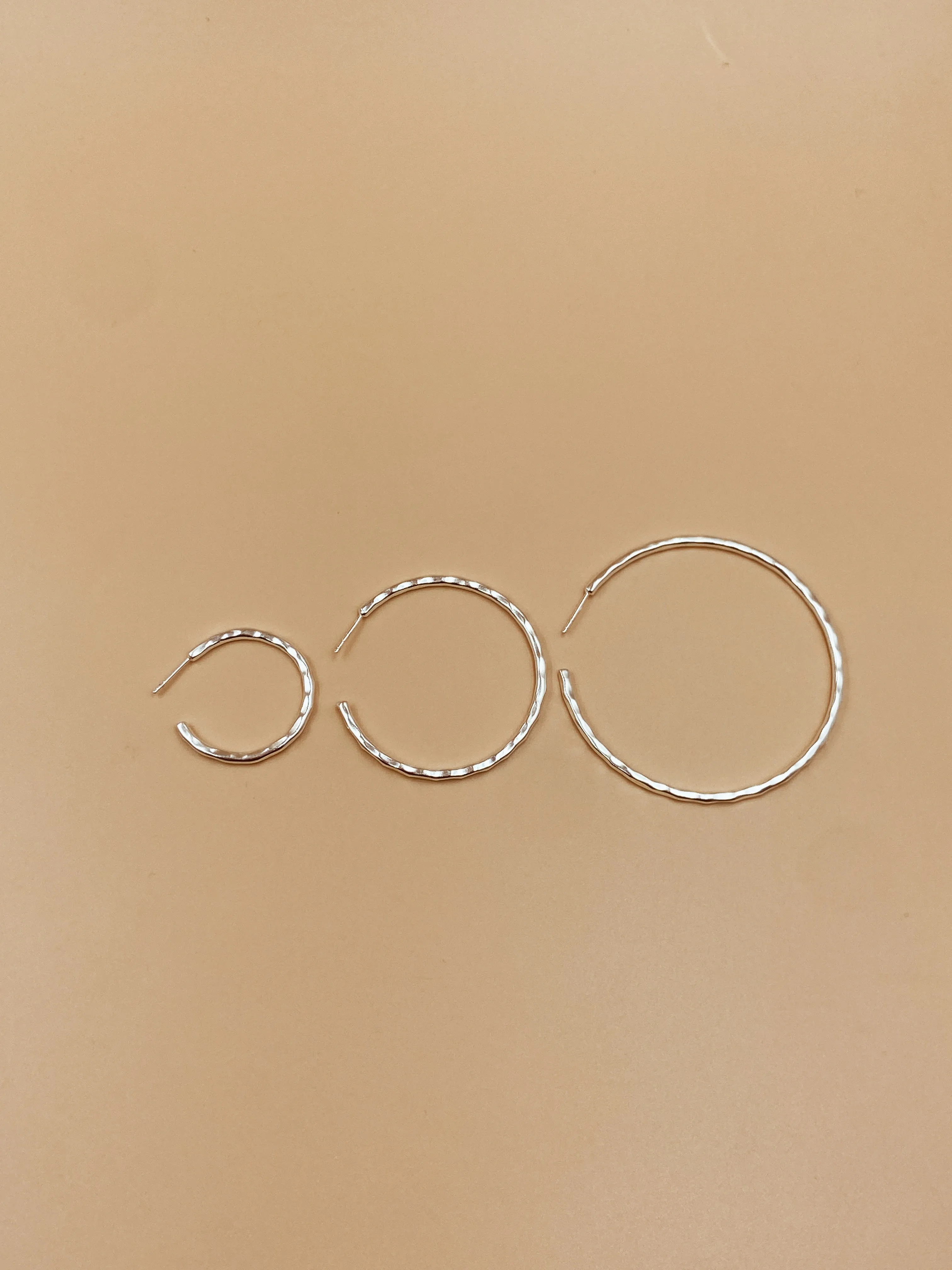 Big Sliced Tycho Hoops in Silver Tone
