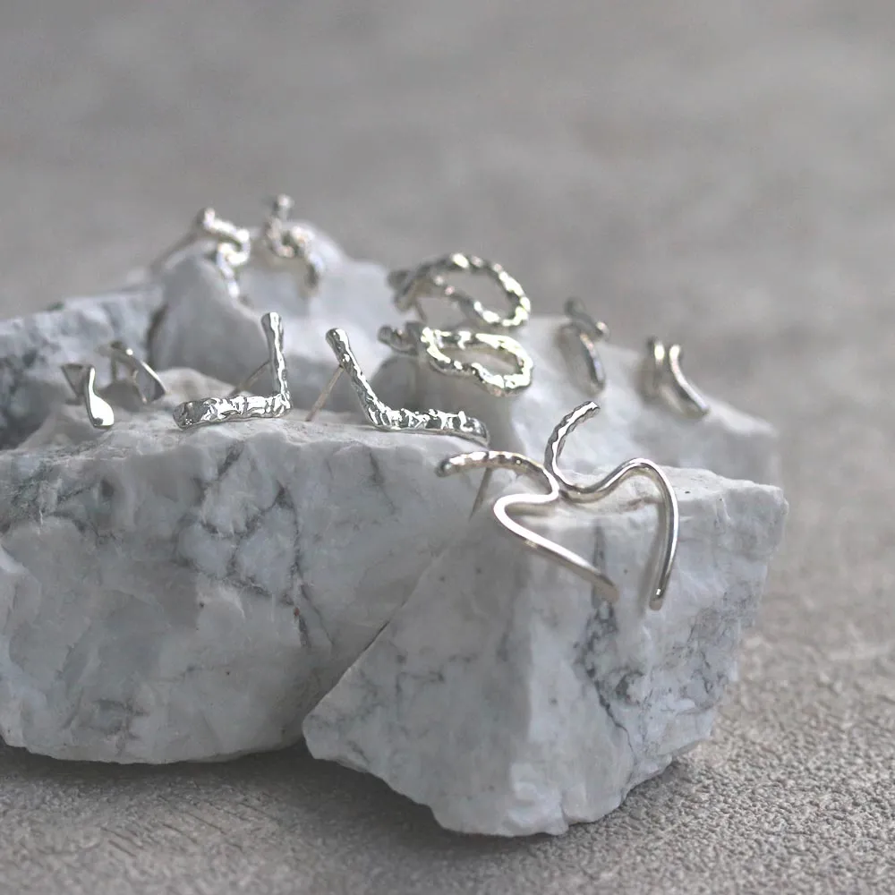 Dimpled Curve Studs