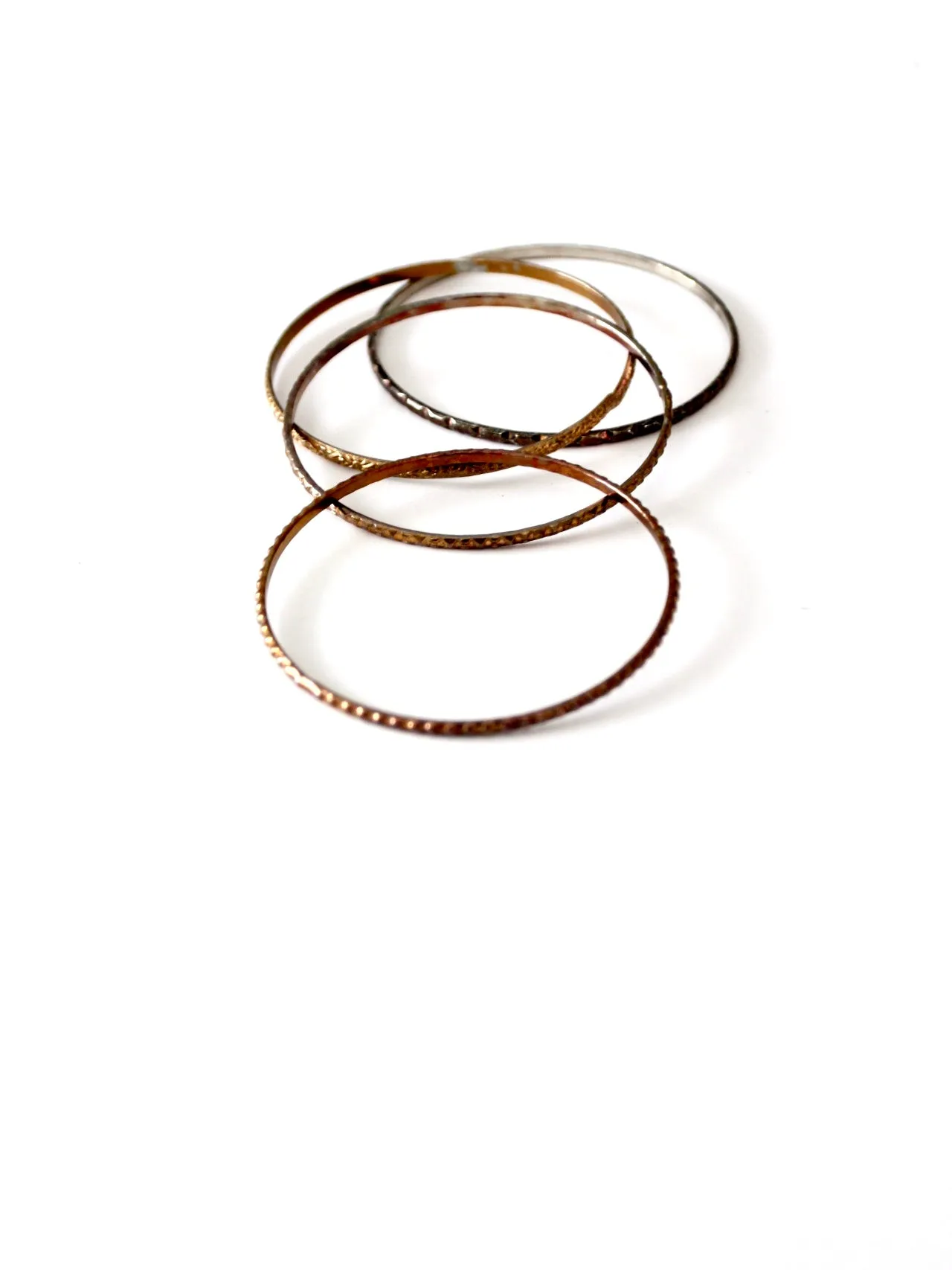 vintage thin metal stacking bangles, set of 4