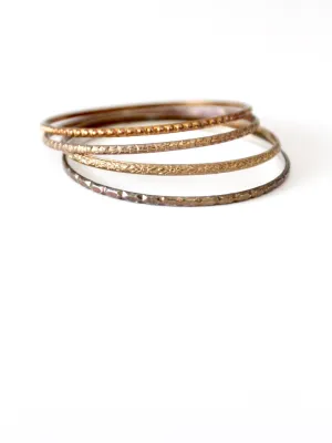 vintage thin metal stacking bangles, set of 4