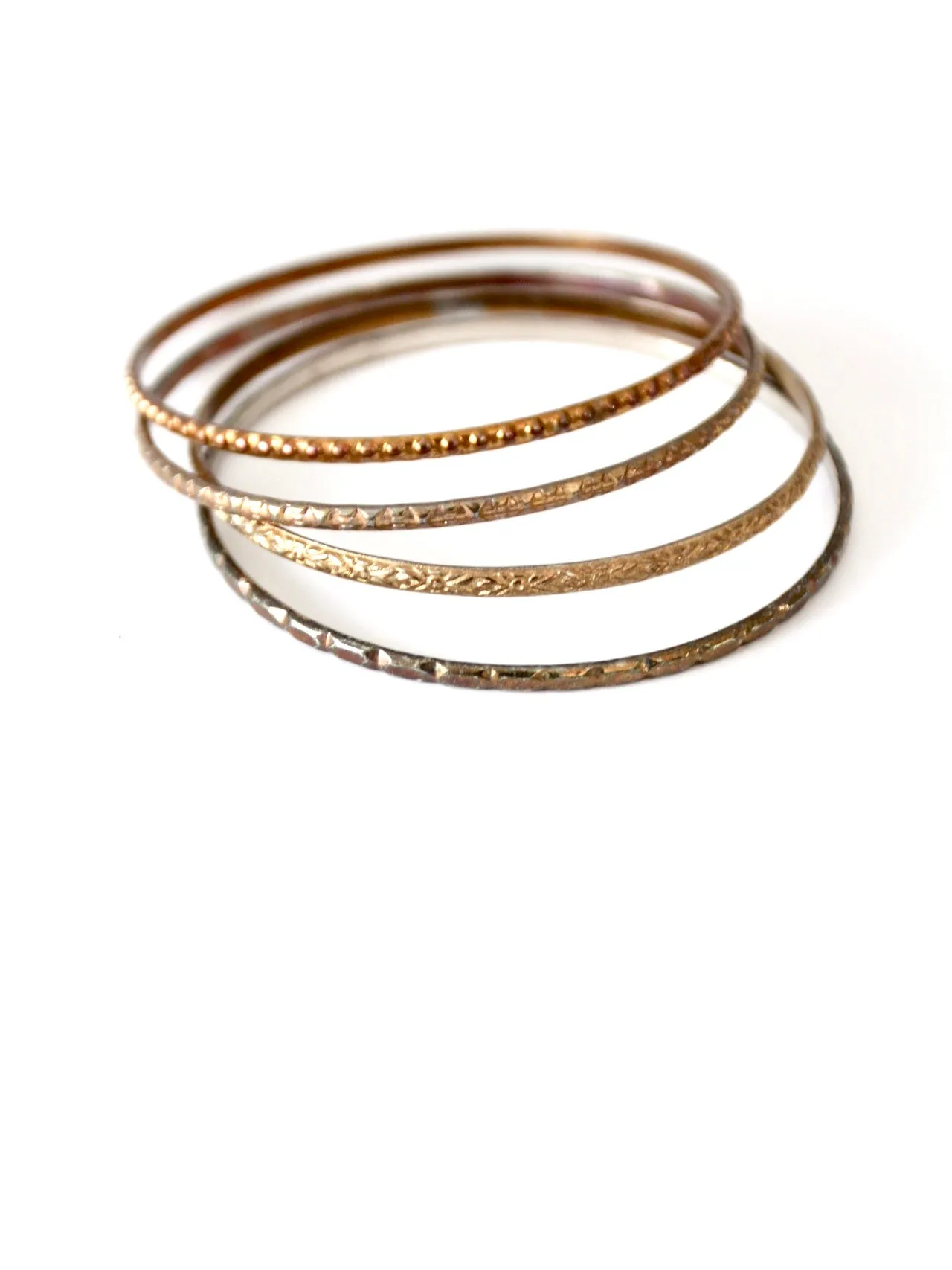 vintage thin metal stacking bangles, set of 4